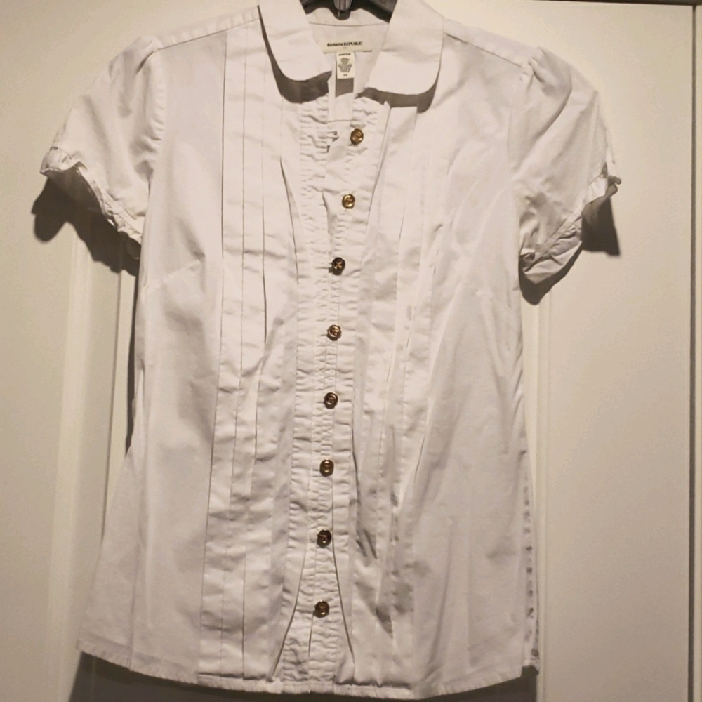 White top w/gold buttons